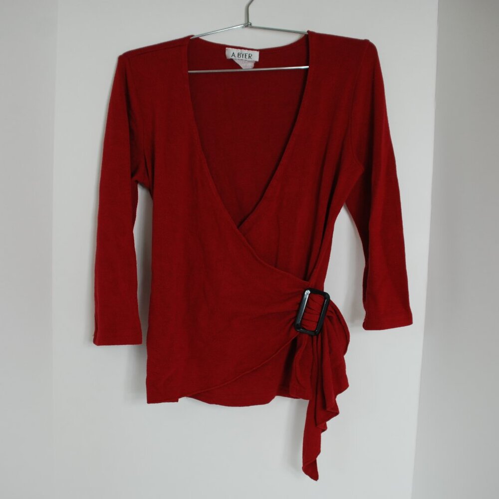 Red, long-sleeved wrap top from the brand A. Byer.